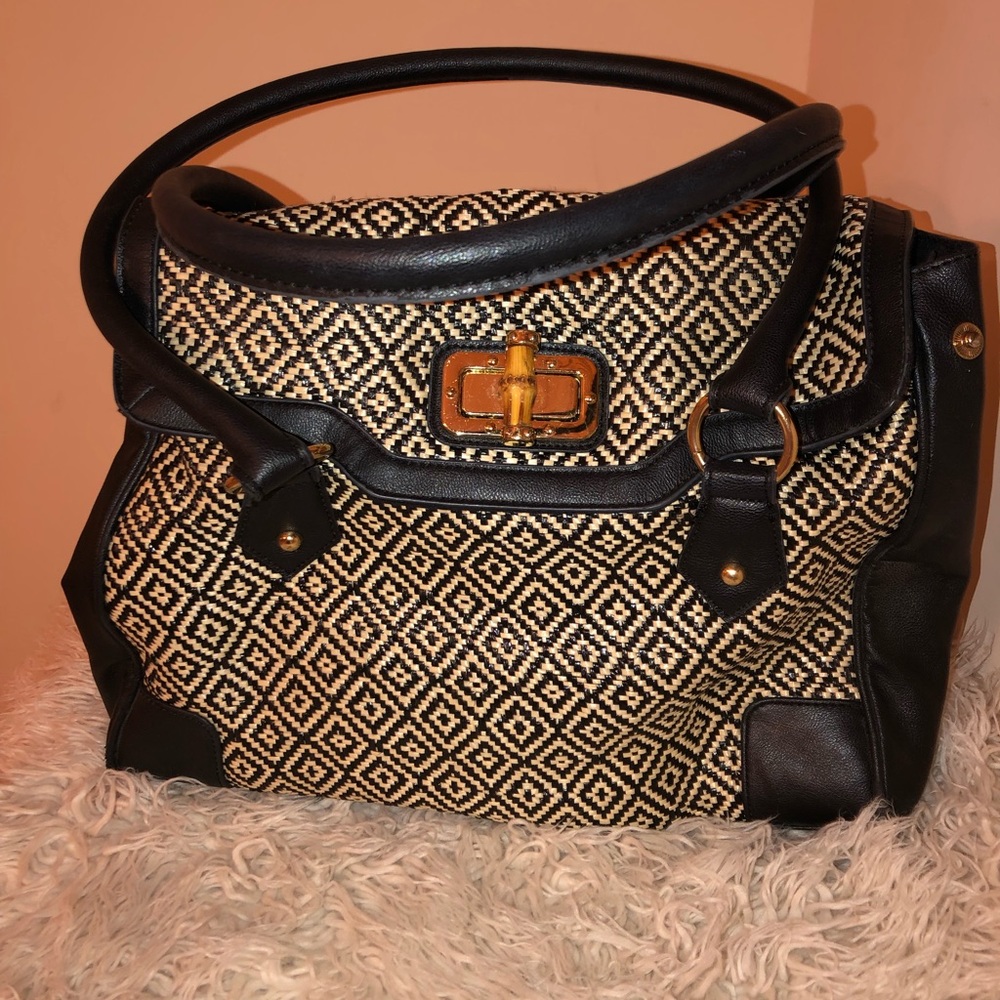 Black and white woven handbag